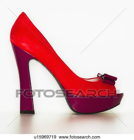 Stock Photo - Studio shot of red high heel open toe shoe. Fotosearch