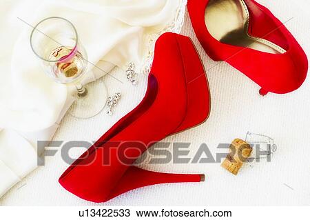 Studio shot of red stilettos glass of wine and cork View Large Photo Image Stock Image - Studio shot of red stilettos glass of wine and cork. Fotosearch