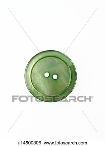 Studio shot of single green button View Large Photo Image Stock Photograph - Studio shot of single green button. Fotosearch