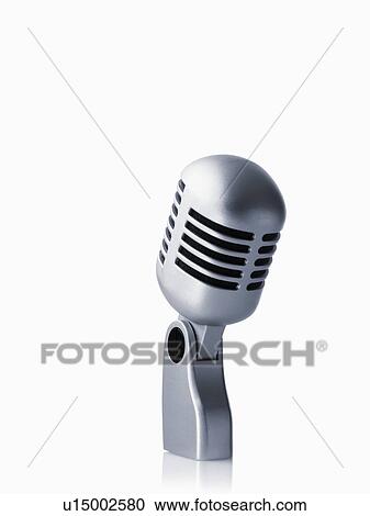 Stock Image - Studio shot of vintage-themed modern microphone on white background. Fotosearch