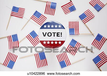 Studio shot of vote pin and small american flags View Large Photo Image Stock Photograph - Studio shot of vote pin and small american flags. Fotosearch