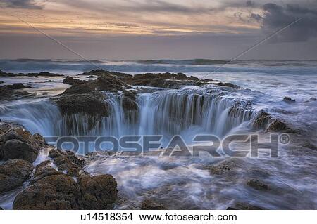 Picture - Thor’s Well at sunset. Fotosearch