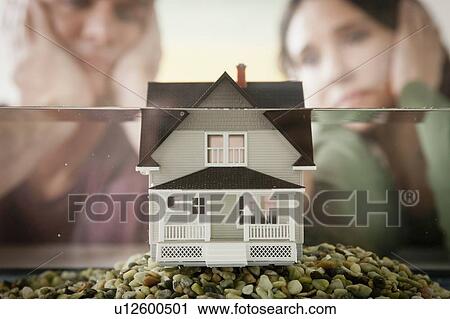Toy house in water View Large Photo Image Stock Image - Toy house in water. Fotosearch