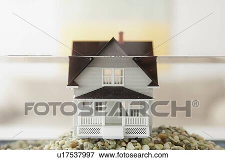 Toy house in water View Large Photo Image Stock Photo - Toy house in water. Fotosearch