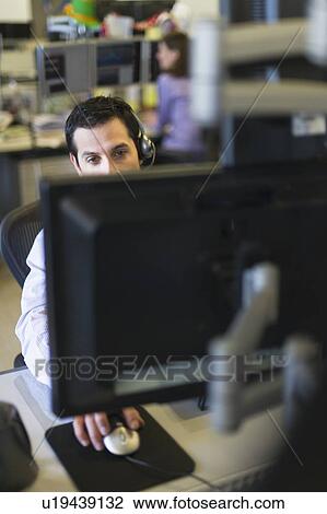 Traders at trading desk View Large Photo Image Stock Image - Traders at trading desk. Fotosearch