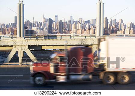 Truck and city skyline View Large Photo Image Picture - Truck and city skyline. Fotosearch