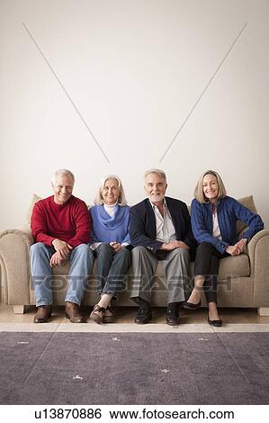 Two senior couples on sofa View Large Photo Image Stock Photograph - Two senior couples on sofa. Fotosearch