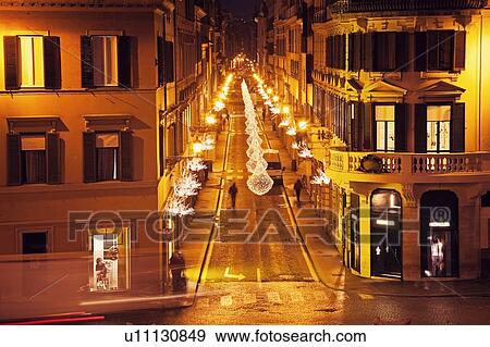 Stock Photo - Via Condotti at night. Fotosearch