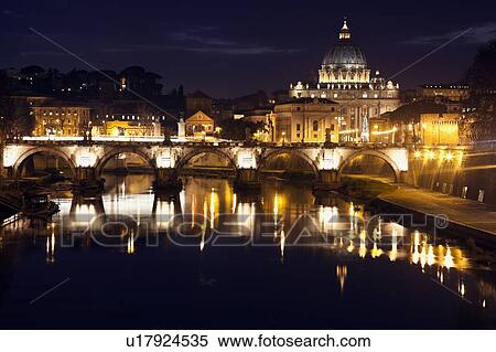 Stock Photography - View over Tiber River towards Vatican at twilight. Fotosearch