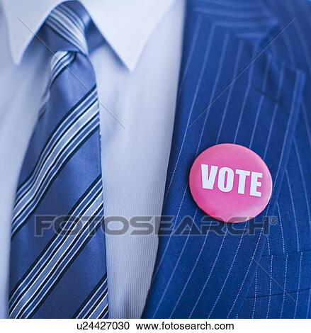 Vote pin on man's lapel View Large Photo Image Stock Image - Vote pin on man's lapel. Fotosearch