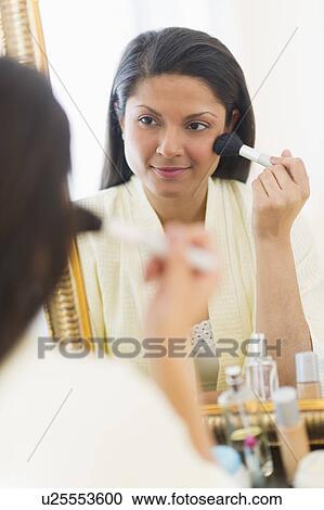 Woman applying blush View Large Photo Image Stock Image - Woman applying blush. Fotosearch