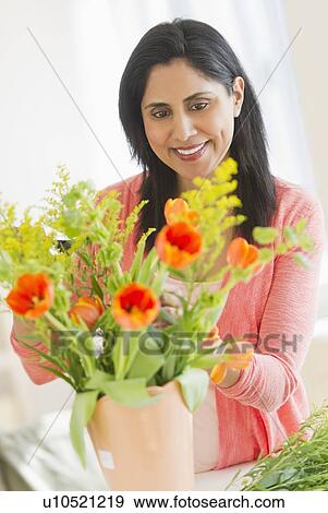 Stock Photo - Woman receiving bouquet. Fotosearch
