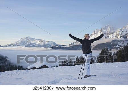 Young woman hiking in winter scenery View Large Photo Image Stock Photo - Young woman hiking in winter scenery. Fotosearch