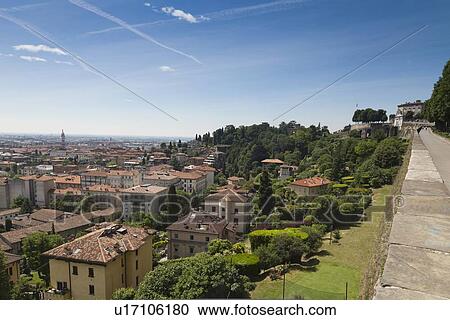 Aerial view of city on hillside View Large Photo Image Stock Image - Aerial view of city on hillside. Fotosearch