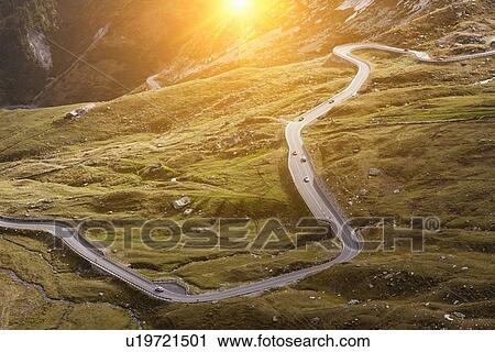 Stock Image - Aerial view of road in rural landscape. Fotosearch
