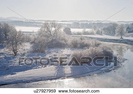 Aerial view of snowy landscape View Large Photo Image Stock Photo - Aerial view of snowy landscape. Fotosearch