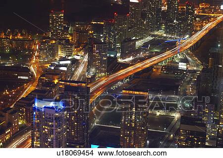 Picture - Aerial view of Toronto lit up at night. Fotosearch