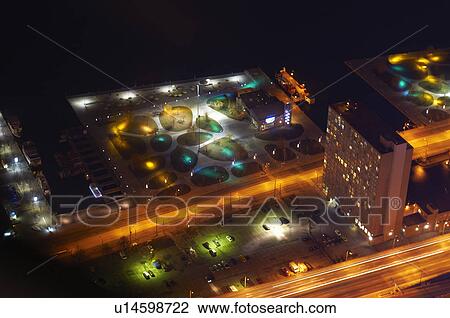 Stock Image - Aerial view of Toronto lit up at night. Fotosearch