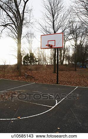 Basketball court in park View Large Photo Image Stock Image - Basketball court in park. Fotosearch