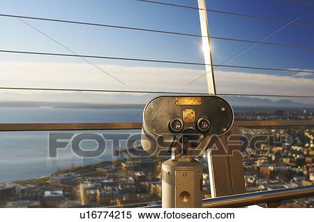 Stock Photography - Binoculars overlooking Seattle skyline. Fotosearch