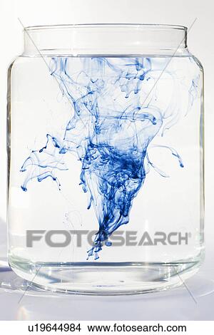 Blue liquid dissolving in water View Large Photo Image Picture - Blue liquid dissolving in water. Fotosearch