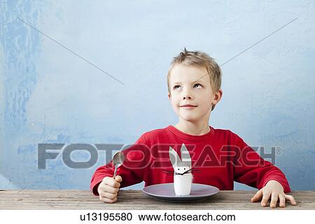 Boy with rabbit decoration on plate View Large Photo Image Stock Image - Boy with rabbit decoration on plate. Fotosearch