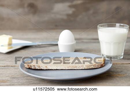 Bread and egg with glass of milk View Large Photo Image Stock Photography - Bread and egg with glass of milk. Fotosearch