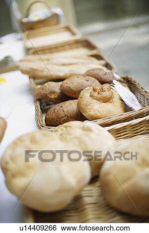 Stock Photograph - Breads for sale on table. Fotosearch