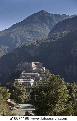 Stock Photograph - Castle built on rural hillside. Fotosearch