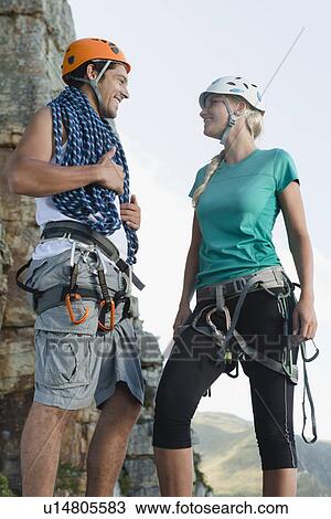 Climbers talking on mountain View Large Photo Image Stock Image - Climbers talking on mountain. Fotosearch