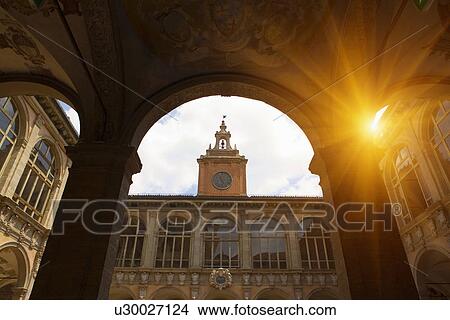 Clock tower viewed through arch View Large Photo Image Picture - Clock tower viewed through arch. Fotosearch