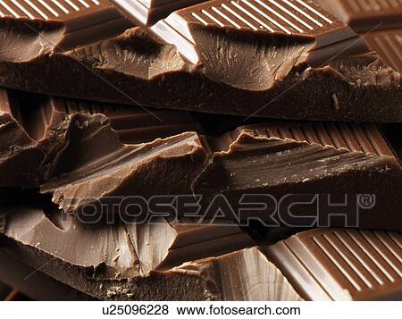 Close up of Belgian milk chocolate View Large Photo Image Stock Photo - Close up of Belgian milk chocolate. Fotosearch