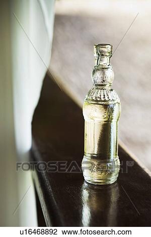 Close up of bottle of massage oil View Large Photo Image Stock Image - Close up of bottle of massage oil. Fotosearch