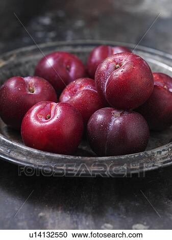 Close up of bowl of plums View Large Photo Image Stock Image - Close up of bowl of plums. Fotosearch