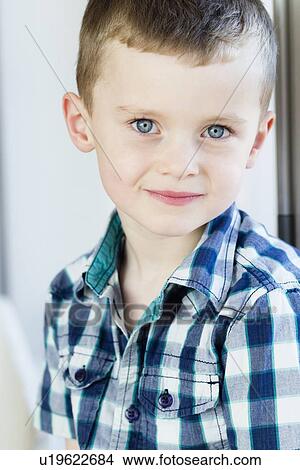 Picture - Close up of boys smiling face. Fotosearch