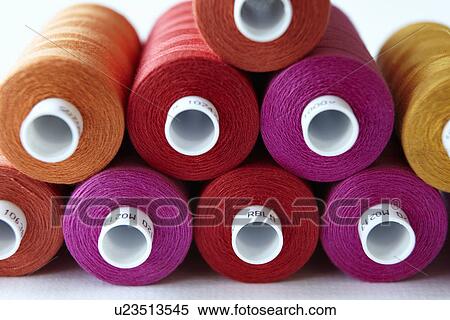 Close up of colorful spools of thread View Large Photo Image Stock Photography - Close up of colorful spools of thread. Fotosearch