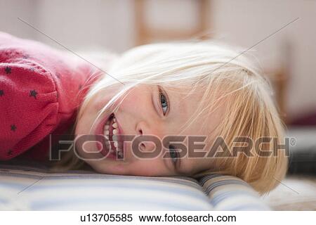 Stock Photography - Close up of girls smiling face. Fotosearch