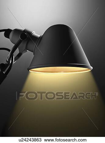 Close up of illuminated desk lamp View Large Photo Image Stock Image - Close up of illuminated desk lamp. Fotosearch