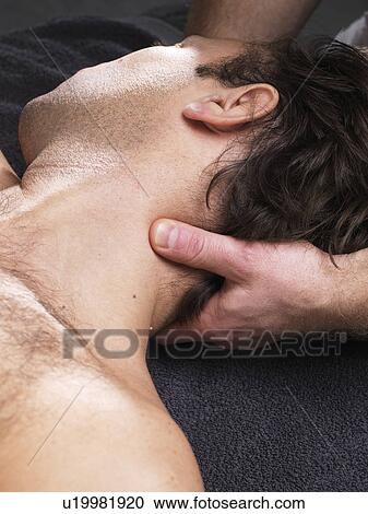 Close up of man having neck massage View Large Photo Image Stock Image - Close up of man having neck massage. Fotosearch