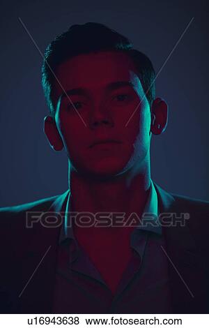 Close up of mans serious face View Large Photo Image Stock Photo - Close up of mans serious face. Fotosearch