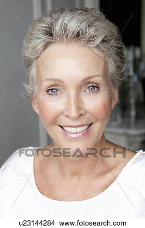 Picture - Close up of older womans smiling face. Fotosearch