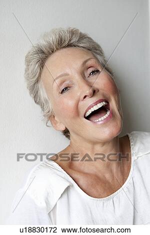 Close up of older womans smiling face View Large Photo Image Stock Image - Close up of older womans smiling face. Fotosearch