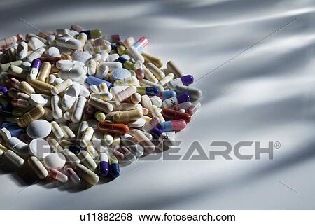 Close up of pile of assorted pills View Large Photo Image Stock Photo - Close up of pile of assorted pills. Fotosearch