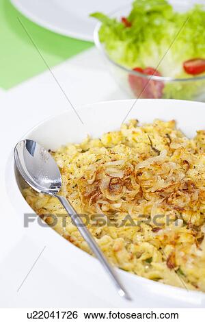 Stock Photograph - Close up of plate of spatzle. Fotosearch