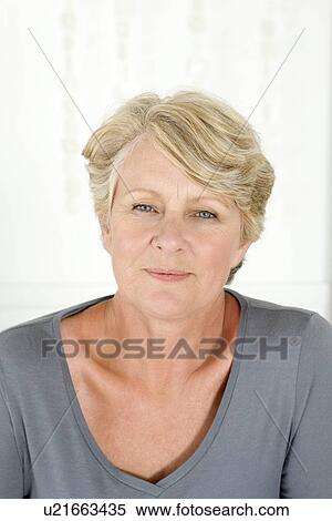 Stock Photography - Close up of smiling older womans face. Fotosearch