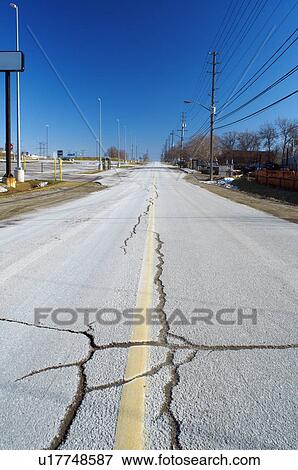 Stock Photo - Cracks in rural road. Fotosearch