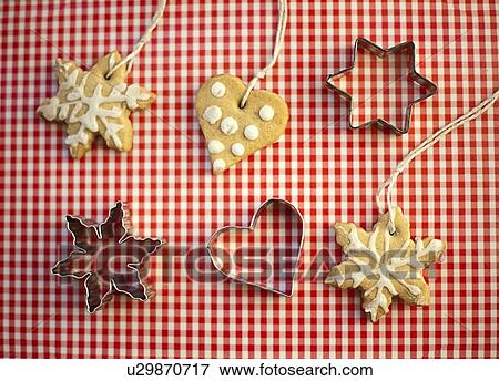 Stock Photo - Decorative cookies with cutters . Fotosearch