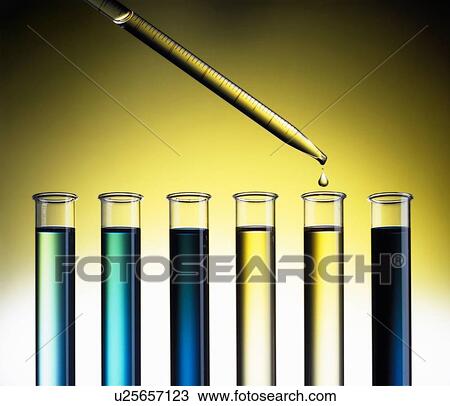 Dropper placing liquid into test tubes View Large Photo Image Stock Image - Dropper placing liquid into test tubes. Fotosearch