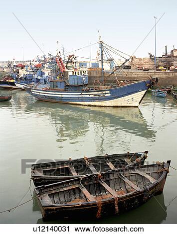 Stock Image - Fishing boats in harbor. Fotosearch