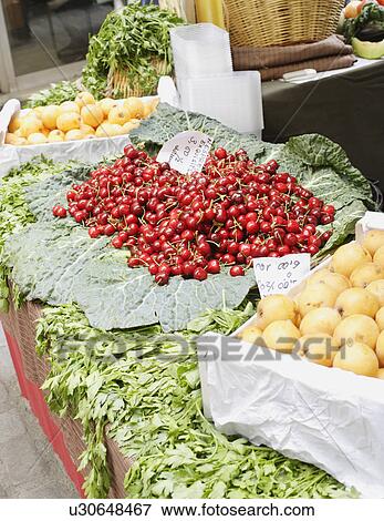 Fresh produce for sale on table View Large Photo Image Stock Photo - Fresh produce for sale on table. Fotosearch